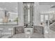 Elegant wine storage display with marble accents near a bright, modern kitchen at 21575 E Twin Acres Ct, Queen Creek, AZ 85142