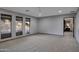 Spacious bedroom with natural light from three windows and neutral paint at 22039 N 86Th Ave, Peoria, AZ 85383