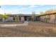 View of the front exterior showcasing a modern home design and neutral colored exterior at 22039 N 86Th Ave, Peoria, AZ 85383