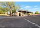 The home has a modern exterior with covered parking, large lot and additional buildings at 22039 N 86Th Ave, Peoria, AZ 85383