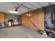 Garage with built-in storage solutions provides organized space at 22039 N 86Th Ave, Peoria, AZ 85383