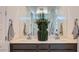 Bathroom featuring double sinks, elegant mirrors, and modern fixtures at 24643 N 164Th Dr, Surprise, AZ 85387