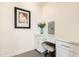 Desk area with drawers, cabinets, gray carpet, and white countertop at 2511 W Queen Creek Rd # 258, Chandler, AZ 85248