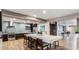 Modern kitchen with a large island, stainless steel appliances, and stylish backsplash at 2511 W Queen Creek Rd # 258, Chandler, AZ 85248