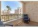 Inviting patio with seating overlooking manicured landscaping and architectural building details at 2511 W Queen Creek Rd # 258, Chandler, AZ 85248