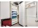 Organized walk-in closet with ample storage solutions, including shelves and hanging rods at 2511 W Queen Creek Rd # 258, Chandler, AZ 85248