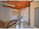 Unfinished basement with concrete walls and exposed ceiling beams at 2815 W Ohio St, Apache Junction, AZ 85120