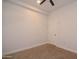 Bedroom featuring neutral carpet and door to the backyard at 2815 W Ohio St, Apache Junction, AZ 85120