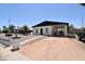 Cozy home showcasing a covered carport, desert landscaping, and a charming walkway to the entrance at 2815 W Ohio St, Apache Junction, AZ 85120