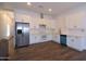 Contemporary kitchen featuring white cabinets, stainless steel appliances, and a clean design at 2815 W Ohio St, Apache Junction, AZ 85120