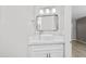Stylish bathroom with a modern sink, sleek mirror, and contemporary lighting fixtures at 286 W Palomino Dr # 147, Chandler, AZ 85225