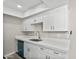Beautiful kitchen featuring white cabinets, modern countertops, and stainless steel appliances at 286 W Palomino Dr # 147, Chandler, AZ 85225