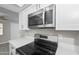 This kitchen features stainless steel appliances and gorgeous countertops at 286 W Palomino Dr # 147, Chandler, AZ 85225
