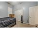 Bedroom featuring a closet, window for natural light, a bed, and carpet flooring at 2976 E Clifton Ave, Gilbert, AZ 85295