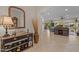 Inviting entryway with a decorative console table and a view into the spacious living area at 3018 E Vernon St, Gilbert, AZ 85298