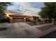 Charming home with a wide driveway, well-kept landscaping, and a welcoming facade at 3018 E Vernon St, Gilbert, AZ 85298