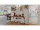 Hallway with decorative table and artwork with views of the bedroom and bathroom at 3018 E Vernon St, Gilbert, AZ 85298