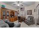 Cozy home office with built-in wooden shelving, providing a comfortable workspace at 3018 E Vernon St, Gilbert, AZ 85298