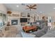Warm and inviting living area with a fireplace, ample seating, and stylish decor, perfect for gatherings at 3018 E Vernon St, Gilbert, AZ 85298