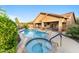 Inviting pool and spa with a well-manicured backyard, ideal for outdoor living at 3018 E Vernon St, Gilbert, AZ 85298