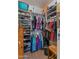 Organized walk-in closet with plenty of hanging and shelf space for clothes and accessories at 3018 E Vernon St, Gilbert, AZ 85298