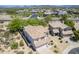 Aerial view of neighborhood home with tile roof and desert landscaping at 31259 N 42Nd Pl, Cave Creek, AZ 85331