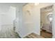 Bright hallway bathroom featuring a toilet, sink, and cabinet with access to a bedroom at 31259 N 42Nd Pl, Cave Creek, AZ 85331