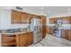 Bright kitchen with stainless steel appliances, granite countertops, and wood cabinets at 31259 N 42Nd Pl, Cave Creek, AZ 85331