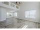 Spacious living room featuring neutral paint, modern flooring, and bright natural light at 31259 N 42Nd Pl, Cave Creek, AZ 85331