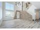 Bright living room with high ceilings, large windows and decorative stone wall at 31259 N 42Nd Pl, Cave Creek, AZ 85331