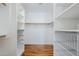 Spacious walk-in closet with custom shelving and ample storage for clothes and accessories at 31259 N 42Nd Pl, Cave Creek, AZ 85331