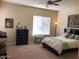 Bright bedroom with a large window, neutral décor, and ample space at 35401 N Via Tramonto St, Phoenix, AZ 85086