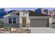 New construction home featuring a neutral color scheme and mountain views at 35765 N King Ln, San Tan Valley, AZ 85140
