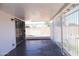A covered back patio featuring decorative metal fencing, offering a versatile outdoor space for relaxation and entertainment at 3651 W Mariposa St, Phoenix, AZ 85019