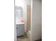 Simple bathroom featuring a single sink vanity and a tiled shower area at 3651 W Mariposa St, Phoenix, AZ 85019