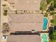 Aerial view of multiple homes with private pools, patios, and well-maintained yards in a residential neighborhood at 4440 E Tether Trl, Phoenix, AZ 85050