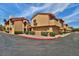 Multi-Gathering residential home complex shows well maintained landscaping with private garages at 5640 E Bell Rd # 1034, Scottsdale, AZ 85254