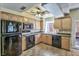 Bright kitchen with stainless steel appliances, tiled backsplash, and plenty of cabinet space at 5640 E Bell Rd # 1034, Scottsdale, AZ 85254