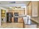 Well-equipped kitchen with modern appliances, ample cabinet space, and access to a laundry area at 5640 E Bell Rd # 1034, Scottsdale, AZ 85254