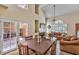 Open floor plan integrating dining, living area, and kitchen with lots of natural light at 5640 E Bell Rd # 1034, Scottsdale, AZ 85254