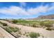 Stunning views of the golf course with the Arizona mountains in the distance at 6190 N Sunrise Ln, Buckeye, AZ 85396