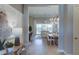 Open-concept living and dining area filled with natural light, perfect for entertaining and relaxed living at 6190 N Sunrise Ln, Buckeye, AZ 85396