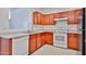 Functional kitchen featuring white appliances and ample counter space at 6843 S 9Th Ave, Phoenix, AZ 85041