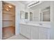 Main bathroom with double sinks, ample counter space, and a large mirror at 6843 S 9Th Ave, Phoenix, AZ 85041