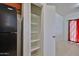 Pantry featuring a built-in shelving unit at 6843 S 9Th Ave, Phoenix, AZ 85041