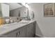 Stylish bathroom with a double sink vanity, large mirror, and contemporary fixtures at 7806 N Via Del Sol --, Scottsdale, AZ 85258