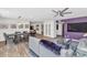 Open living space featuring tile floors, a formal dining room, and a comfortable living room with gray sofas at 7806 N Via Del Sol --, Scottsdale, AZ 85258