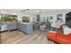 Open concept living space featuring the living room and kitchen with access to the outdoor patio at 7806 N Via Del Sol --, Scottsdale, AZ 85258