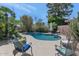 Private pool area with lush landscaping and outdoor seating at 7806 N Via Del Sol --, Scottsdale, AZ 85258