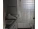 Comfortable bathroom offering a shower-tub combination, vanity storage, and bright lighting at 7807 E Main St # D-26, Mesa, AZ 85207